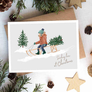 Sledging Snowy Day Christmas Card